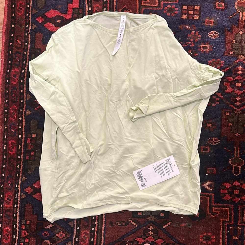 NWT lululemon size 4 back in action long sleeve top